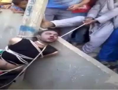 فلاح مصري يشنق شابا أمام الناس وبغياب السلطة