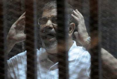 الإعدام لمرسي وبديع وغيابياً للقرضاوي