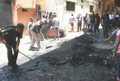 مبادرة شعبية ازالت اثار الاشتباك في «حي طيطبا» في مخيم عين الحلوة دعوات الى معالجة الوضع المدني.. لمنع تكرار المأساة
