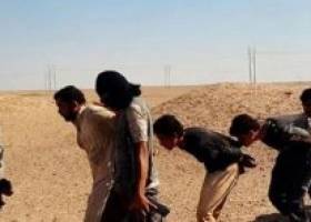 "داعش" يعدم 12 مدنيا عراقيا بجرافة مرت فوق رؤوسهم