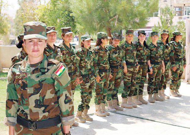 "فتيات الشمس".. كتيبة إيزيدية تقودها مطربة!