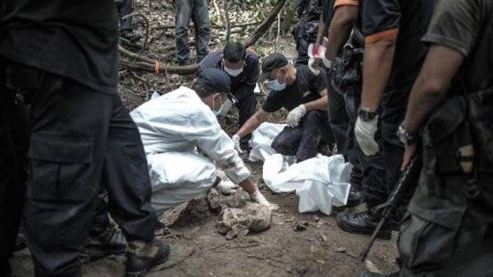 ماليزيا: العثور على 24 هيكلا عظميا يرجح أنها لضحايا تجار البشر