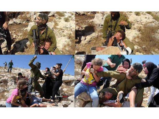 بالفيديو - شاهد جندي إسرائيلي حاول اعتقال طفل فلسطيني فكانت له النساء بالمرصاد