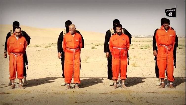 بالصور: في أحدث فظائعه.. داعش يشوي 4 أشخاص على أرجوحة‎