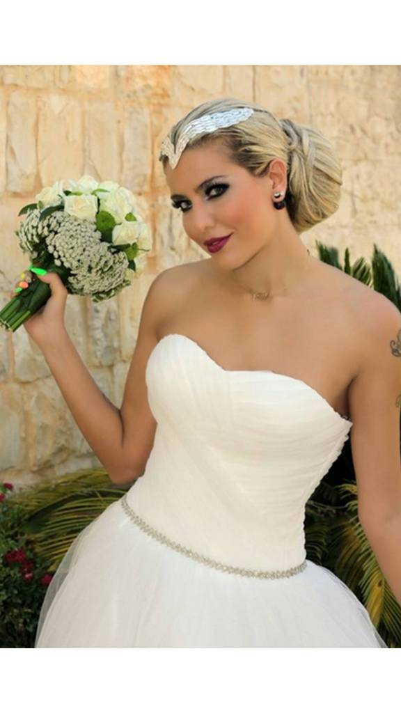 بعد طلاقها من جورج الراسي.. جويل حاتم تستعرض جمالها بفستان زفاف