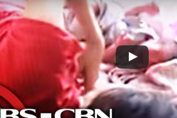بالفيديو.. أم مريضة تضرب طفلها حديث الولادة