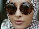 شاهد.. أول عارضة أزياء محجبة لـ"H&M" تثير الجدل