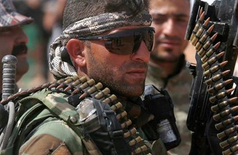 "الحشد الشعبي": أمريكا تدعم "داعش" وروسيا المنقذ