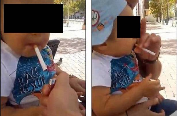بالفيديو: طفل يدخن ويشرب البيرة بتشجيع من والده