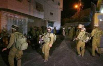 جيش الاحتلال يعتقل 12 فلسطينيا في الضفة الغربية