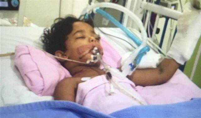 بالصور.. خادمة حاولت قطع رأس طفل في الرياض