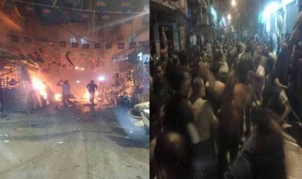 ناشطون من الحراك المدني يضيئون الشموع مكان وقوع التفجير في برج البراجنة