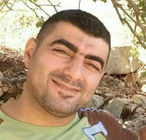 بالصورة الشهيد عادل ترمس الذي منع الانتحاري الاول من دخول مسجد الامام الحسين في برج البراجنة