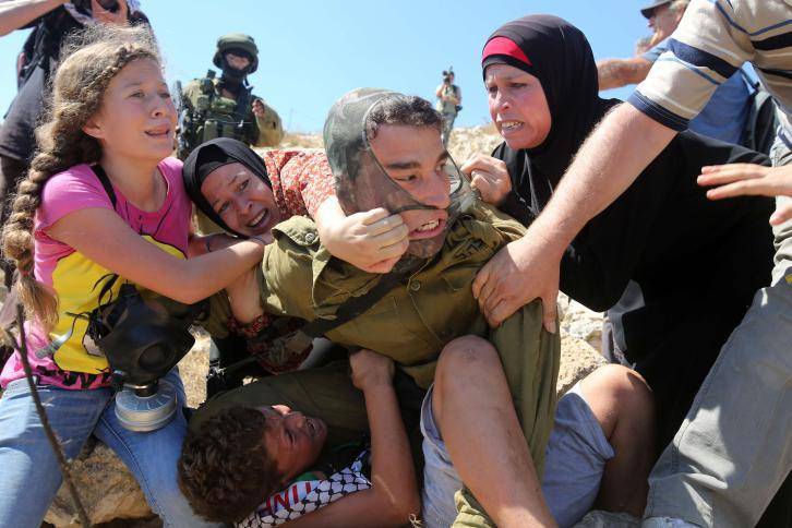 بالصور الوكالة الفرنسية أ ف ب تختار أفضل خمس صور التقطها مصوروها في فلسطين خلال هذا العام، فماهي هذه الصور؟!