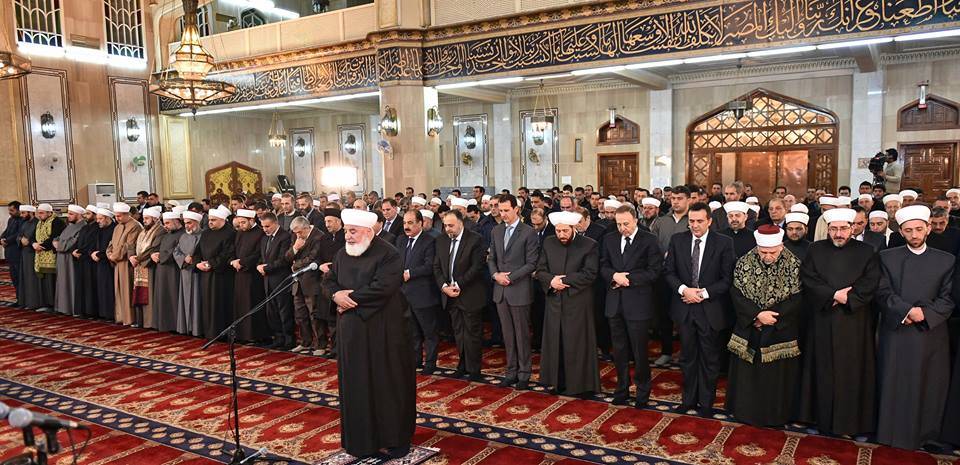الأسد يشارك في إحياء ذكرى المولد النبوي