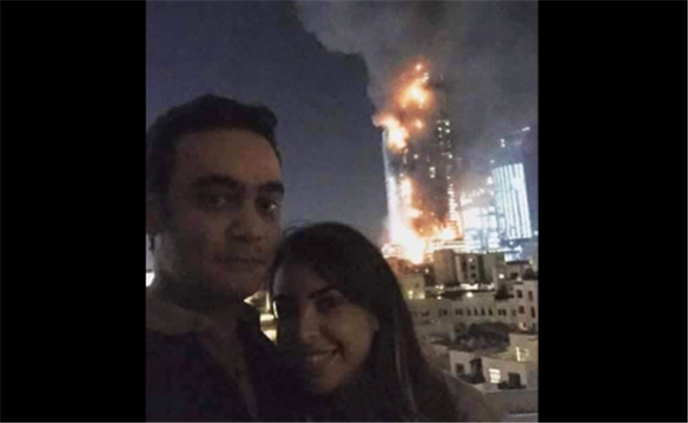 رجل يتعرض للإنتقاد بسبب التقاطه سيلفي أمام برج دبي المحترق