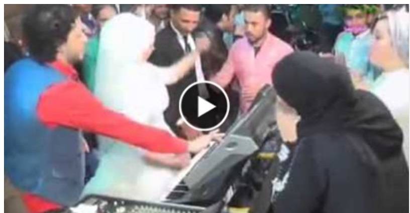 بالفيديو: شاهد عروس تشعل حفل زفافها وتقود "الدي جي" بنفسها فى مشهد حصد ملايين المشاهدات!