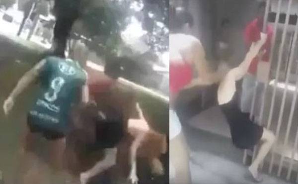 زوجة تضرب عشيقة زوجها وتلقيها في النهر .. فيديو
