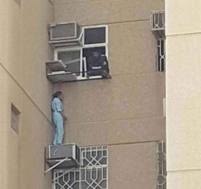 بالصور.. خادمة تحاول الانتحار بالقفز من أعلى برج سكني