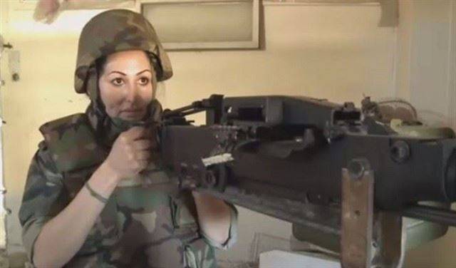 بالفيديو.. مروضة أسود سورية تشارك في معارك حلب