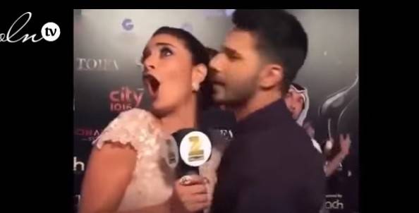 بالفيديو: ممثل يقبل مذيعة على الهواء.. ماذا فعلت؟