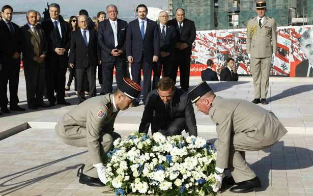 بون وضع إكليل زهر بإسم هولاند على ضريح الحريري