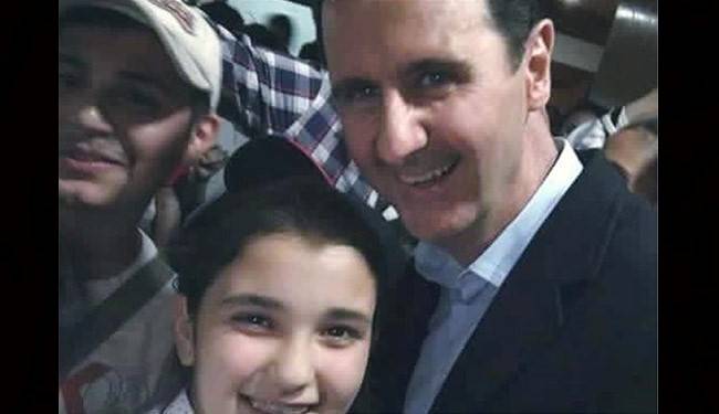 بالصور؛ عشرات السيلفي مع الاسد وعائلته بظهور مفاجئ وسط دمشق