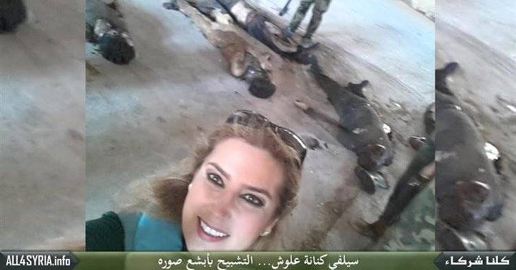 بالفيديو: كيف بررت الإعلامية السورية صورتها مع.. الجثث؟!