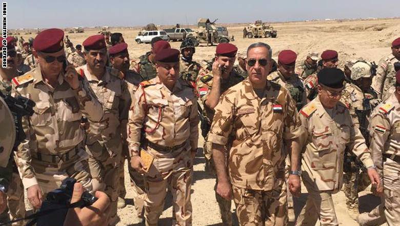 وزير الدفاع العراقي يعلن تحرير منطقتي الصبيحات والفلاحات غرب الفلوجة من قبضة "داعش"