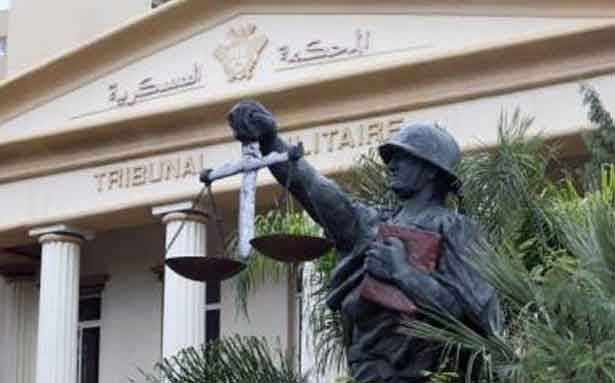شاويش الطابق في المبنى «ب» يقوم بتعداد المساجين