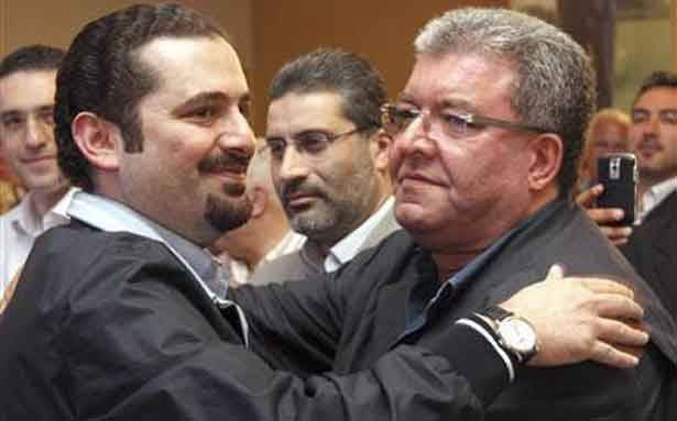الحريري يحمل طابتين في يد واحدة