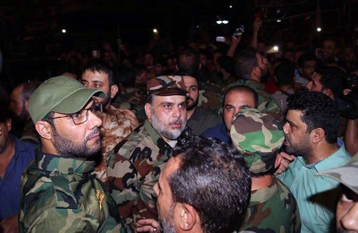 بالصور..الصدر يصل الكرادة بزي عسكري وموكب ضخم