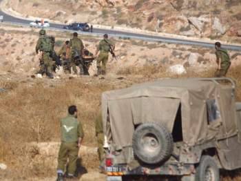 وسائل إعلام إسرائيلية: الجيش اعتقل 9 فلسطينيين بالضفة الغربية ليلة أمس