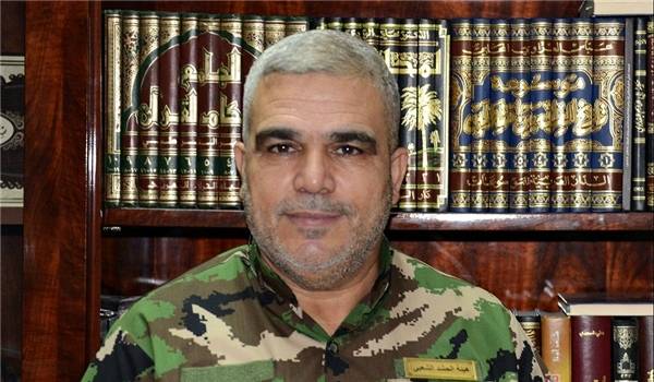 الحشد الشعبي يدعو دول العالم الى التعامل معه بواقعية إذلاله لداعش