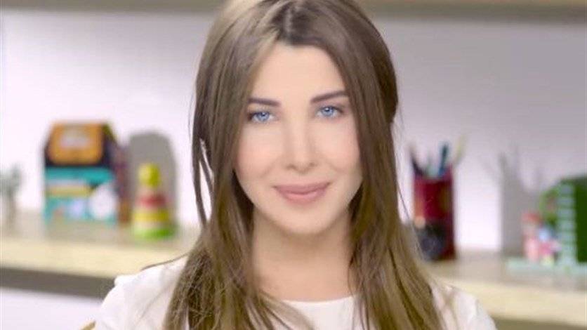 صورة نانسي عجرم تثير جدلاً.. والسبب قبلة