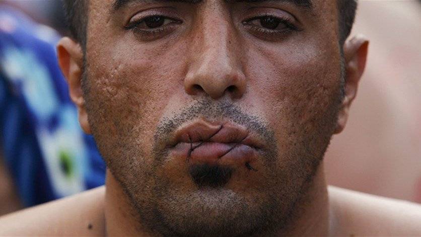 بالصورة: تخييط الأفواه بأسلاك معدنية عقوبة "داعش" الجديدة...فما هي التهمة؟