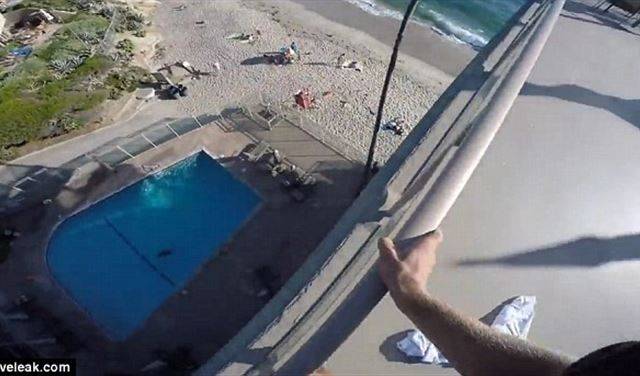 بالفيديو.. مغامر يقفز من سطح فندق إلى حمّام السباحة