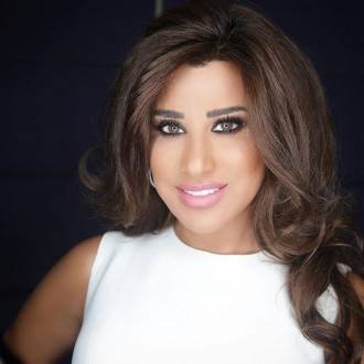كيف هنأت نجوى كرم مصمّم أزيائها في عيده؟