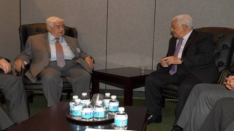 المعلم يلتقي الرئيس الفلسطيني محمود عباس