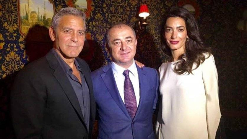ماذا بين بو صعب وآل كلوني؟