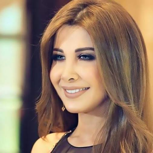 صورة نانسي عجرم ترافق ابنتها إلى المدرسة تشعل المواقع