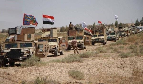 تحرير آخر معاقل داعش في الرمادي و رفع العلم العراقي فوقه