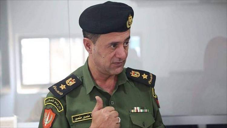 فصل من الخدمة وسنة سجن لضابط فلسطيني انتقد مشاركة عباس في جنازة بيريز