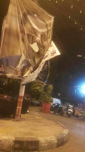 مجهولون مزقوا آخر صورة للحريري في منطقة باب الرمل بطرابلس