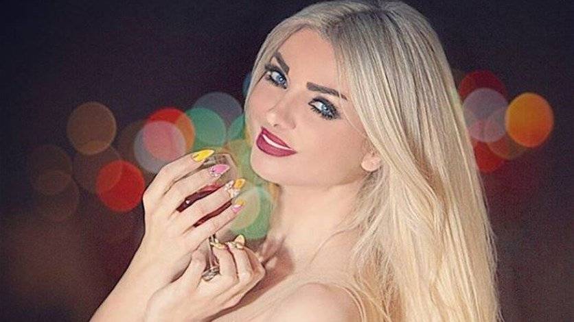 بالصورة - الملكة ميريام كلينك ومفتول العضلات في البرلمان اللبناني؟