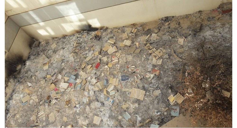 بالصور...آثار "داعش" على مخطوطات تاريخية للمسيحيين العراقيين