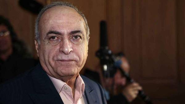 من هو اللبناني "الغامض" ناقل أموال القذافي إلى ساركوزي.. و كيف تم تسليمه المبلغ؟