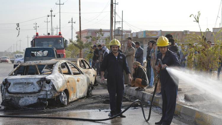 شهداء وجرحى بتفجير مفخخة داخل محطة وقود جنوب بغداد