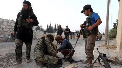 1000 إرهابي يغادرون حلب بلا سلاح