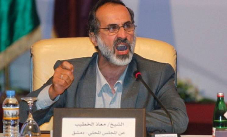 بقّ البحصة..معاذ الخطيب: من أحرق الباصات مجرم أصيل يخرّب سوريا